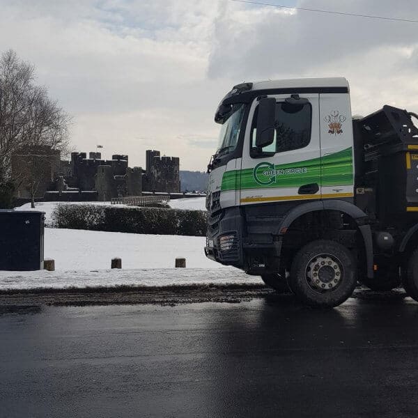 Image of aggregate truck in front of snowy castle
