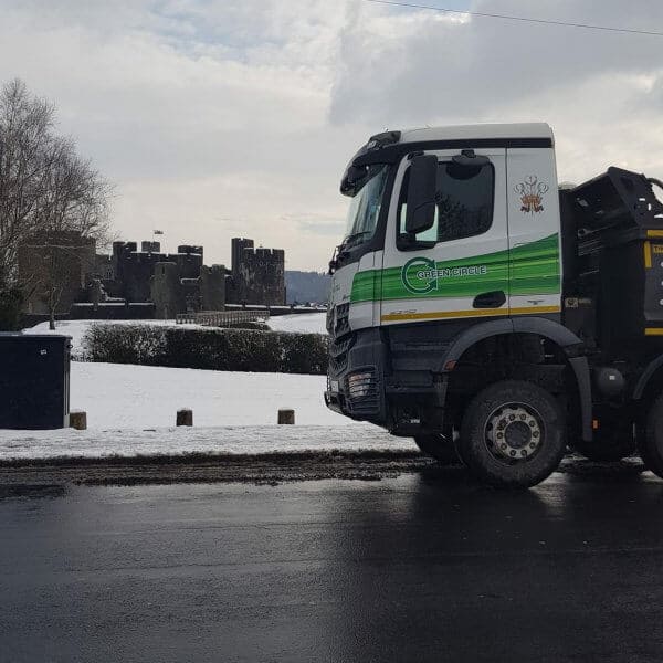 aggregate truck in front of snowy castle South Wales