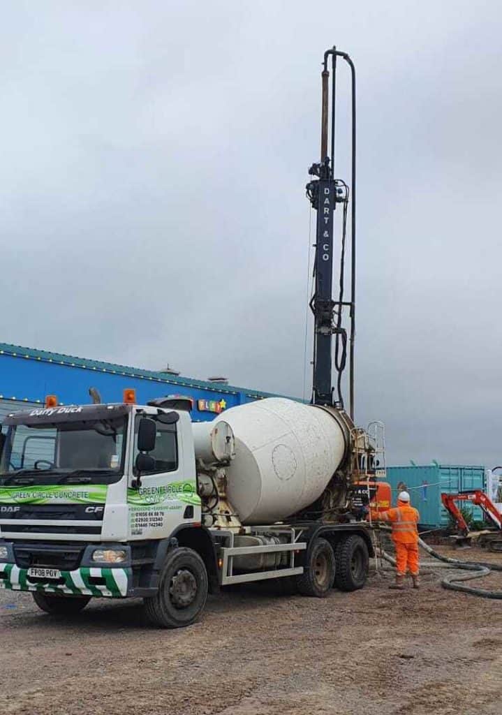 Drum concrete mixer with pump